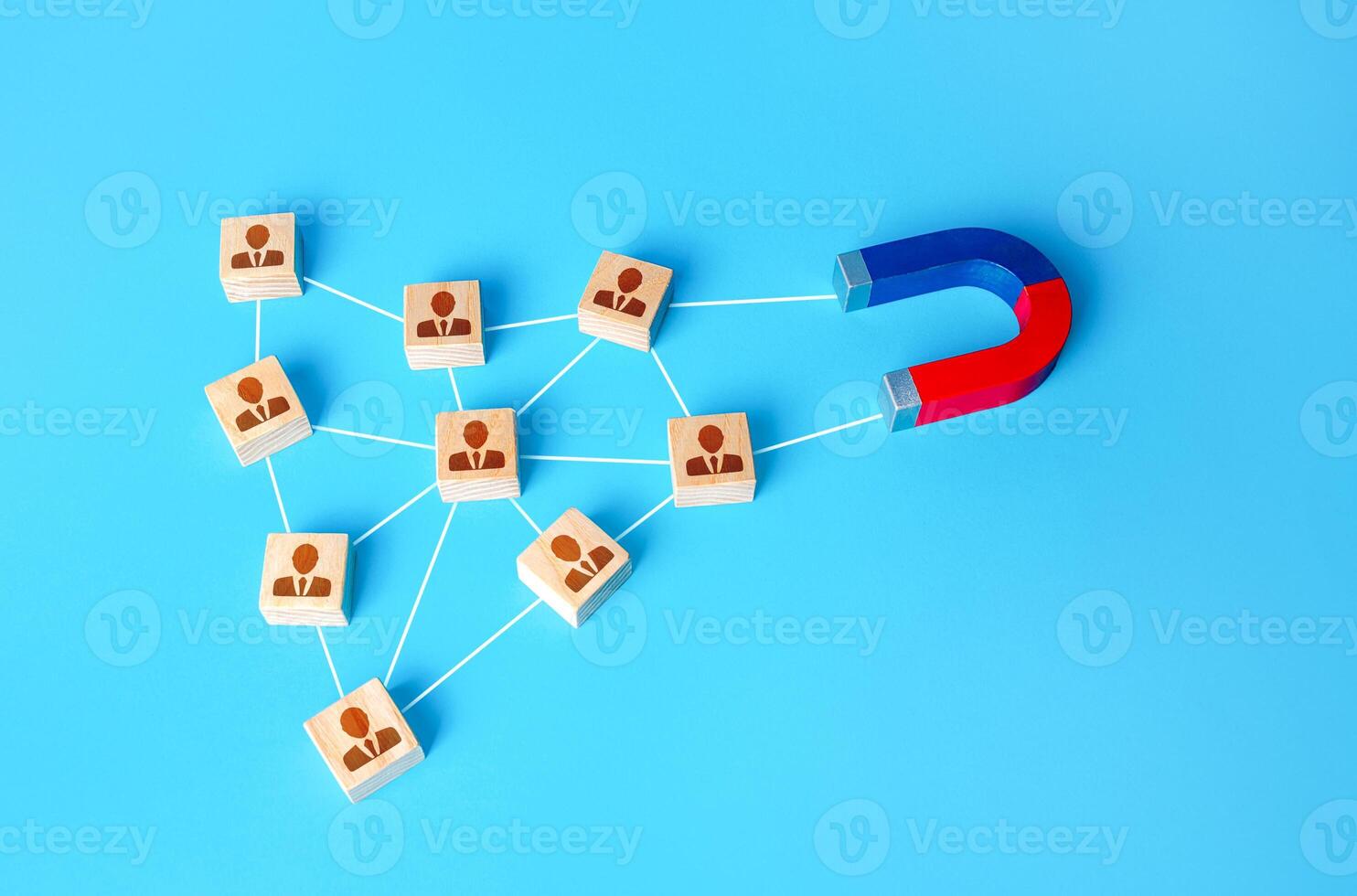 The magnet interacts with the company's network of people. Attracting new customers based on recommendations and good reviews. Business team building. Recruitment of entire formed teams of employees. photo