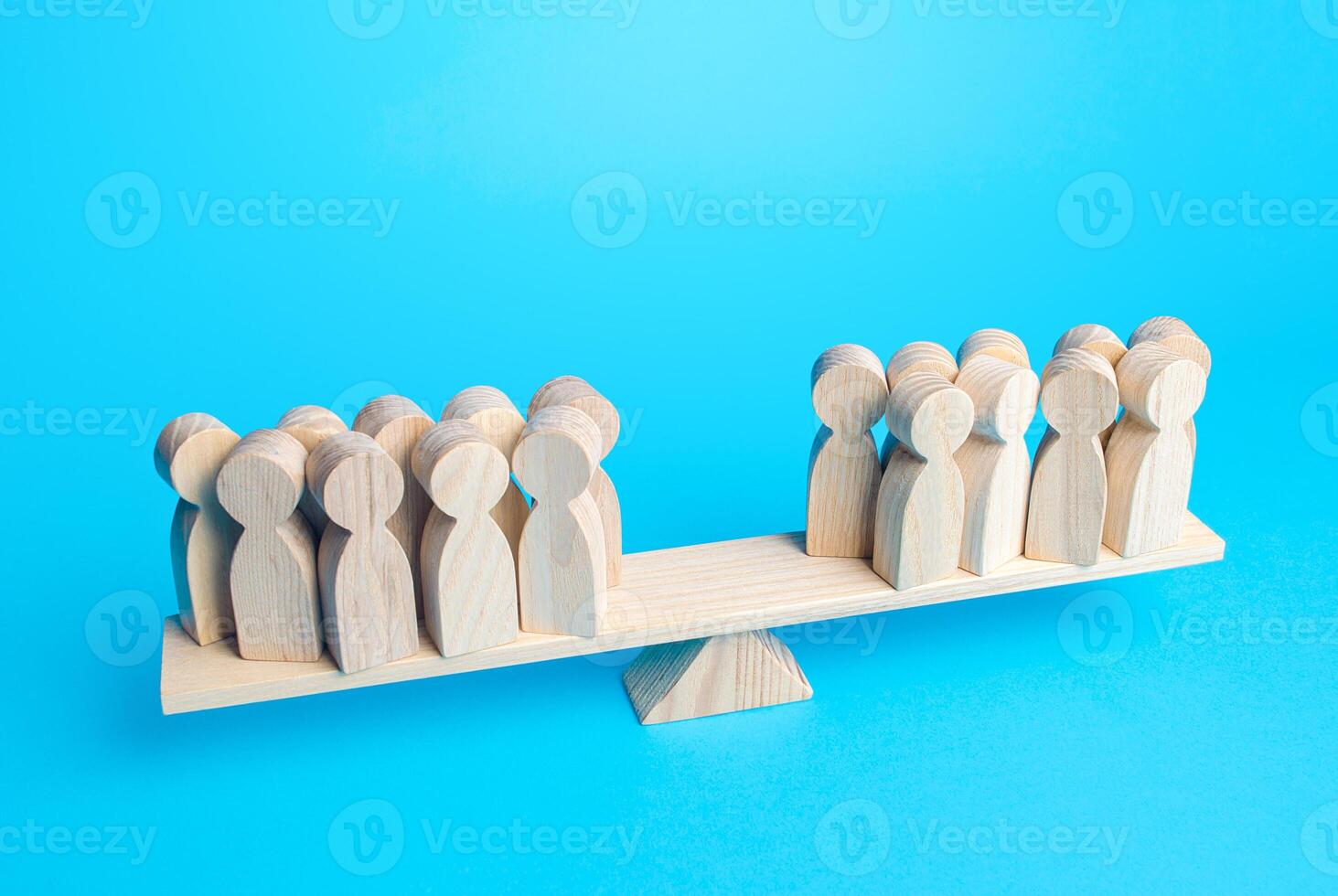 Groups of people stand counterbalanced to each other on the scales. Voting on the issue. Public opinion. Political process, democratic elections. Collective opinion polls. Disputes and Disagreements. photo