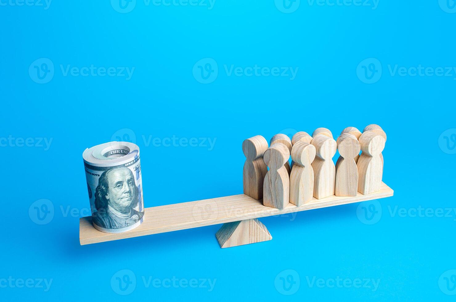 A group of people and a bundle of dollars on the scales. Financial support in a difficult economic situation. Minimize damage to the economy. Population solvency. Company productivity. Debt burden photo