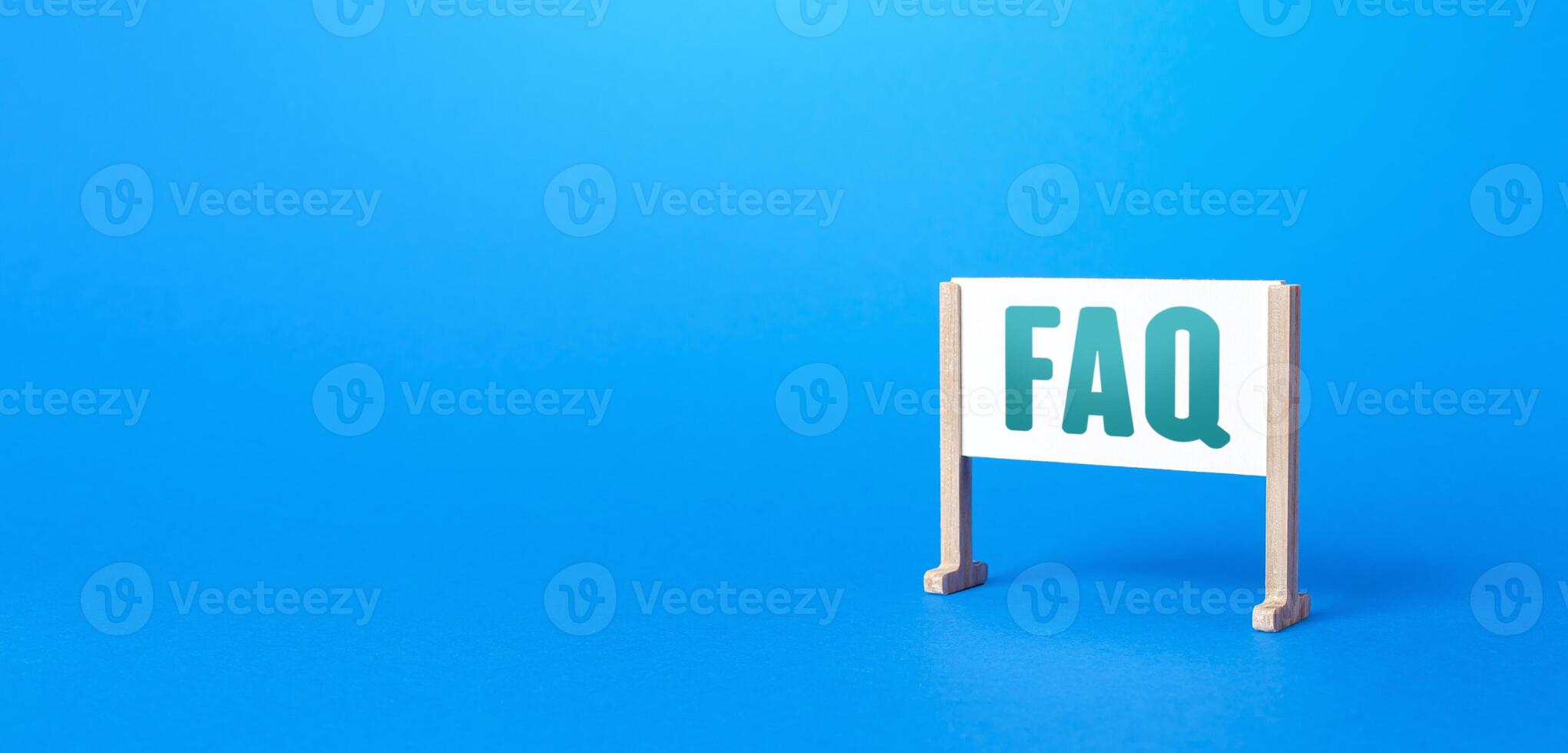 Board stand with word FAQ frequently asked questions. answers explanations for users and customers. Instructions and rules. Guide and navigation. Tips and comments notes. Systematization knowledge photo