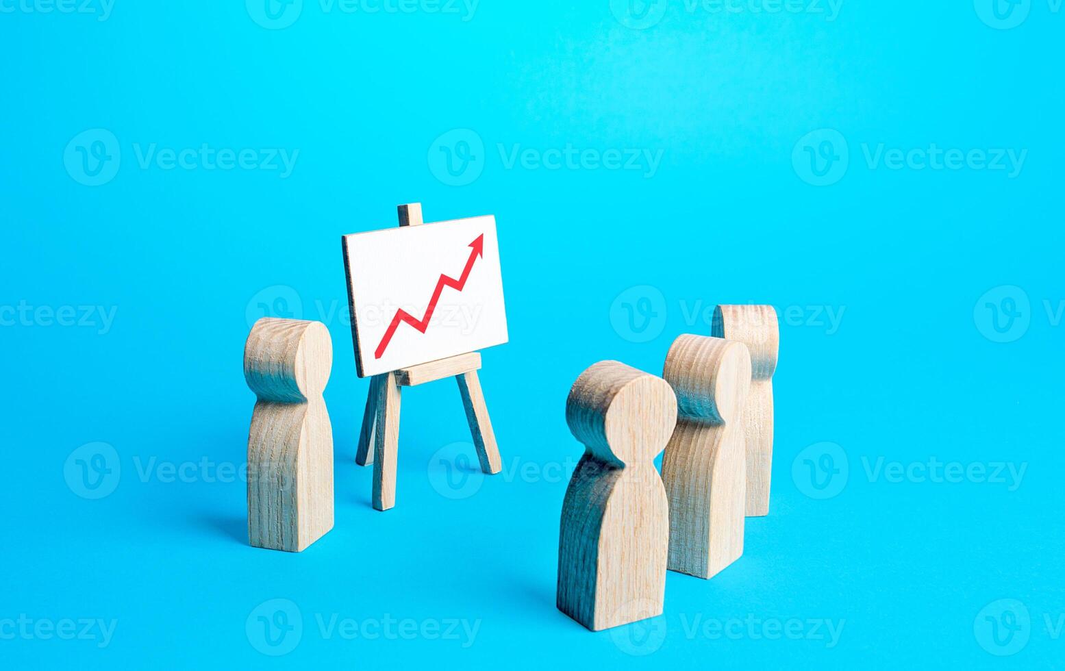 People in the meeting are looking at the presentation of the results of the easels with a red arrow pointing up. Statistics and data. Business development. Marketing strategy. Economic forecasting. photo