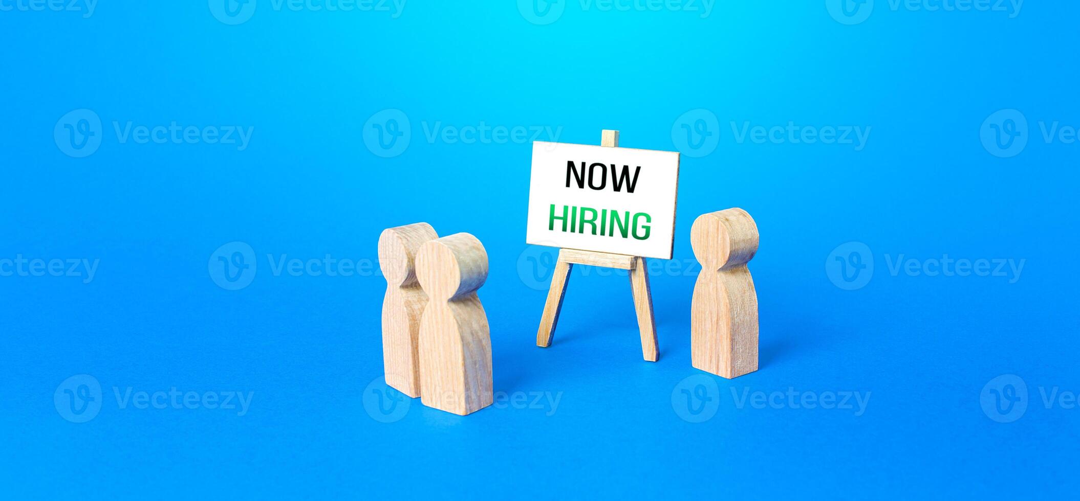 People and easel with a call Now hiring. Recruitment new employee workers. Search for specialists and professionals. Staff job interview. Headhunter hr. Selection of candidates for open vacancies photo