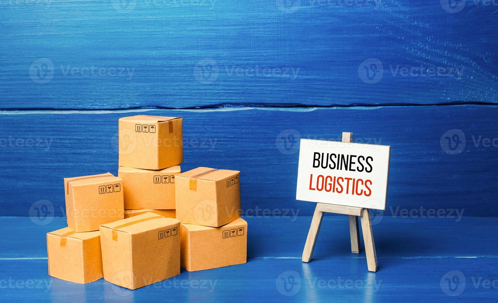 Boxes and easel with Business logistics. Supply chain management and efficiency logistics. Engaging intermediaries, marketing and advertising. Commerce cooperation, retail delivery . photo