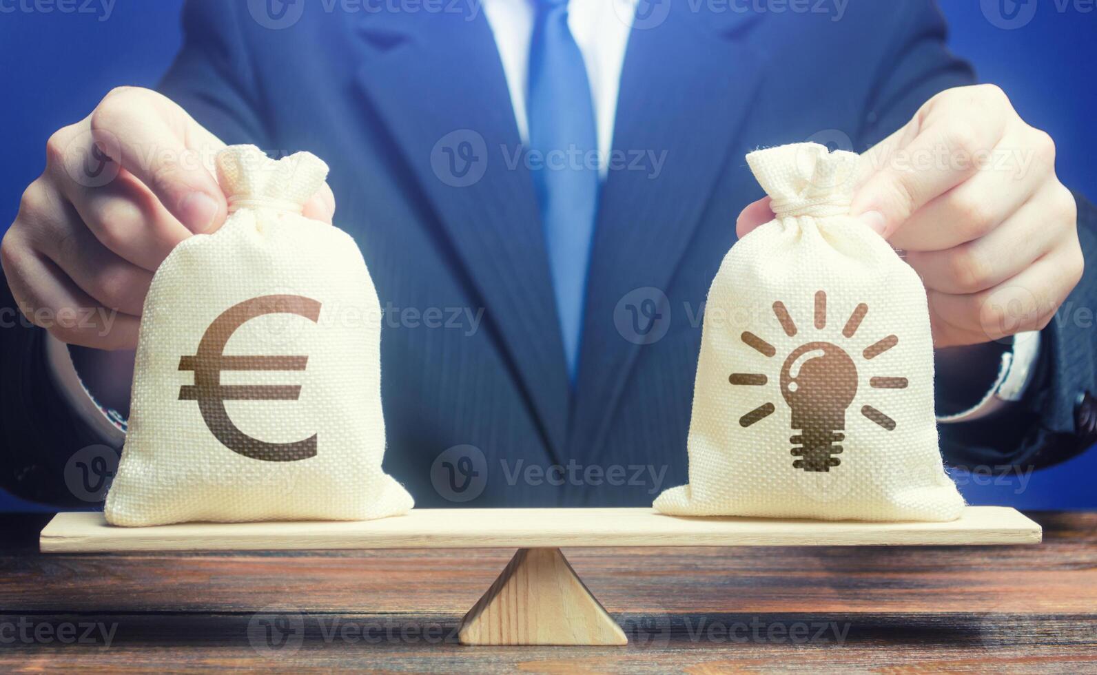Euro money bag and ideas patents. Buying a startup. Invest in promising companies, technologies. Educational grants. Brain drain. Stimulating development of innovative business, scientific progress. photo