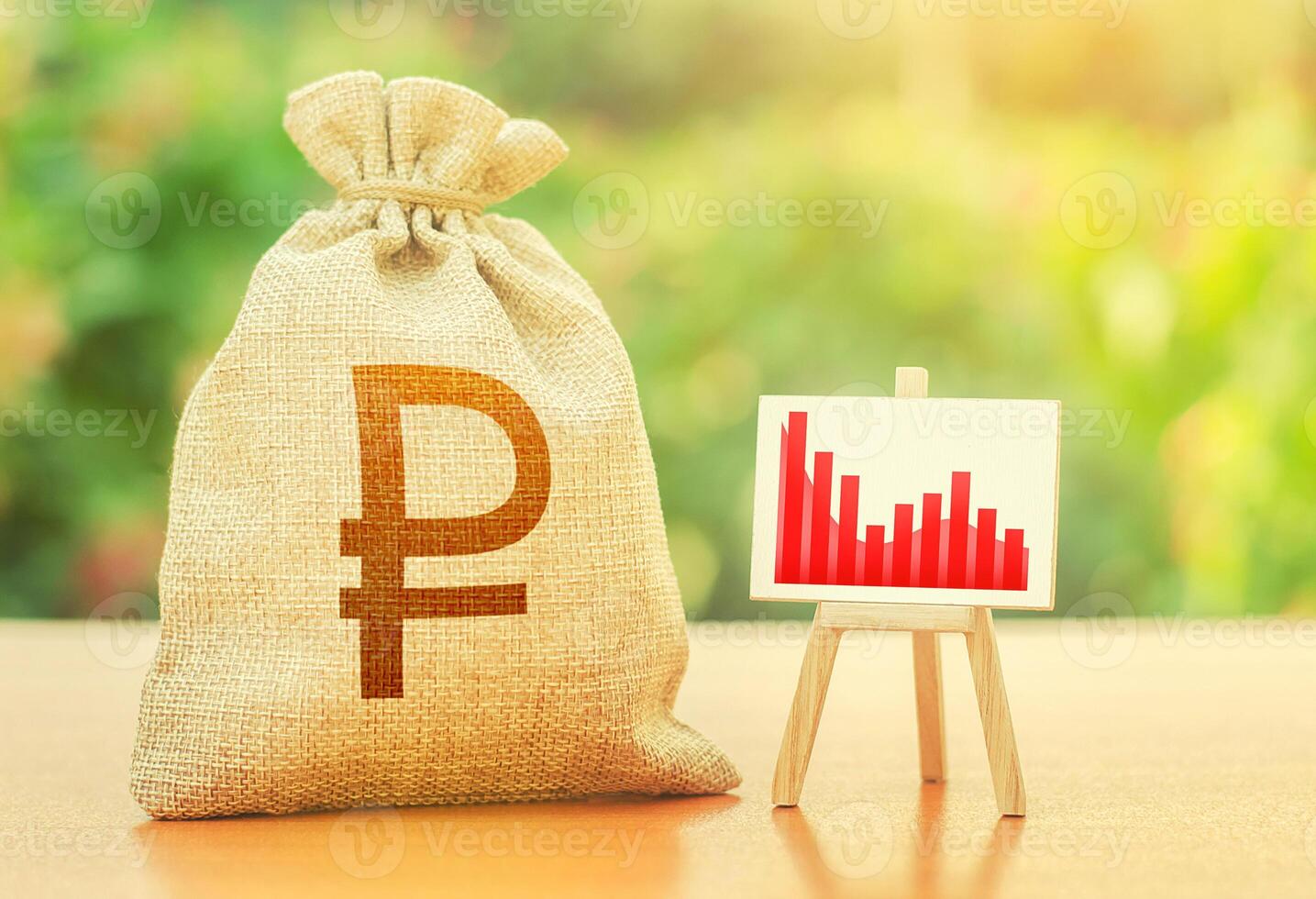 Russian ruble money bag and easel with red negative growth graph chart. Economic stagnation and recession, negative reactions to economies and currencies to external factors and new sanctions. photo