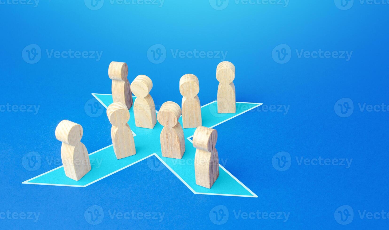 People stand in shape of a blue x. Combining forces to successfully solve the problem. Social tension, protest. Unification into a political party. Consolidation, cooperation and collaboration. photo