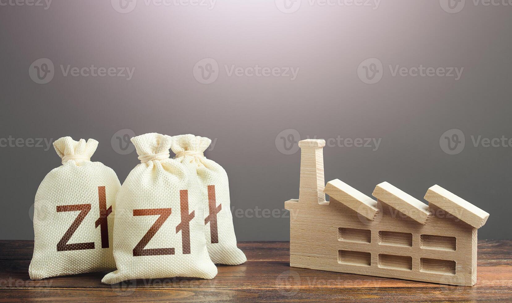Polish zloty money bags and industrial factory plant. Economic support. Investment in modernization, reduction harm to environment. Privatization, purchase of industrial complexes. Sale at auction photo