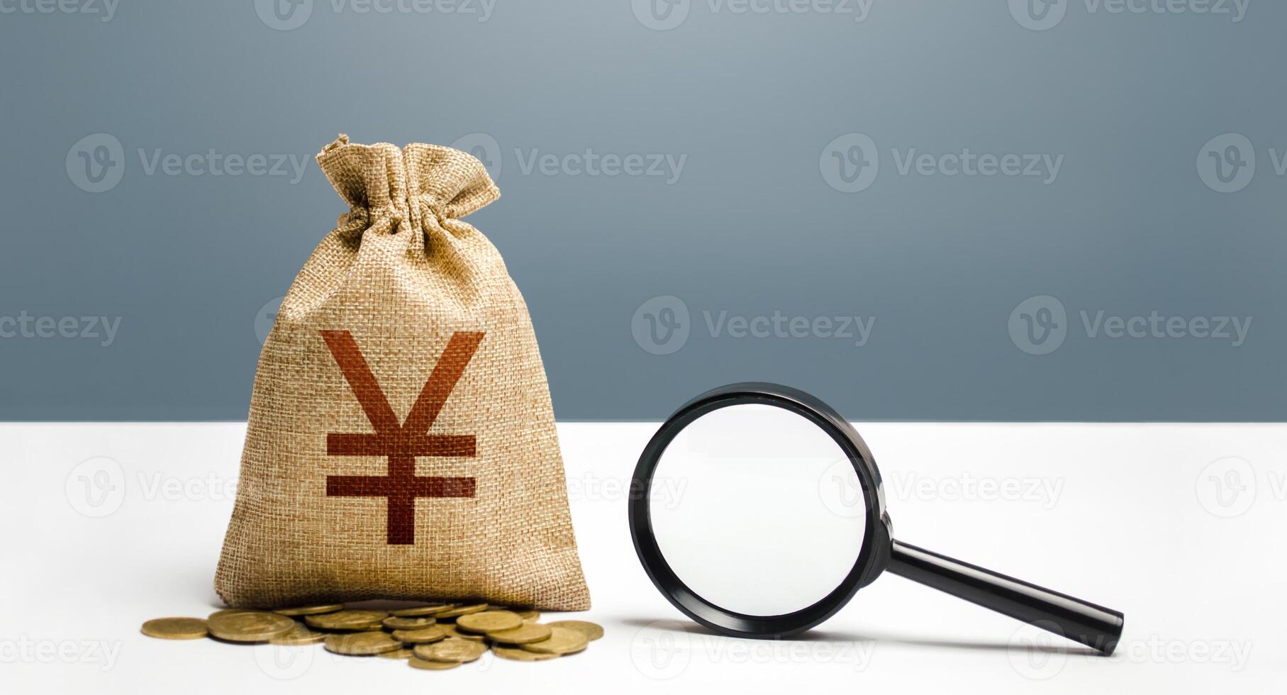 Yen yuan money bag and magnifying glass. Financial audit and monitoring of suspicious capital and transactions. Search for business beneficiaries. Attracting investments and financing. Budget check photo
