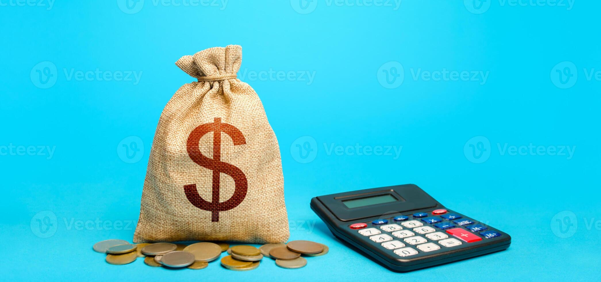 Dollar money bag and calculator. Accounting concept. Analysis of loan selection. Budgeting. Income and expenses. Summing up the financial results. Calculation of damage and insurance payments. photo