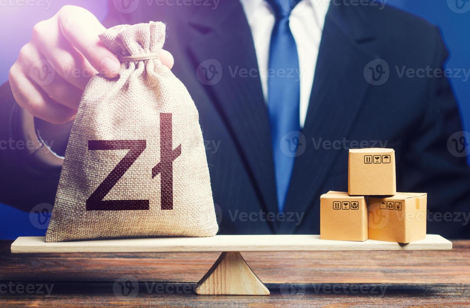 Polish zloty money bag and boxes on scales. Trade balance and purchasing power. Economic and industrial development. Import and export duties, profit from the sale of value added goods. VAT photo