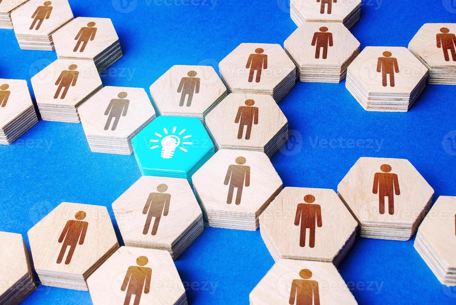 People structure growing around the idea. Founding a business company around a startup or ideological goal. Cooperation, teamwork. Strength in unity. Achieving goal. Innovation, fresh ideas. photo