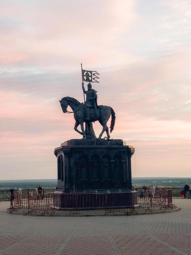 Vladimir, Russia - August, 15, 2024 Monument to Prince Vladimir And Saint Fedor against the sunset sky. photo