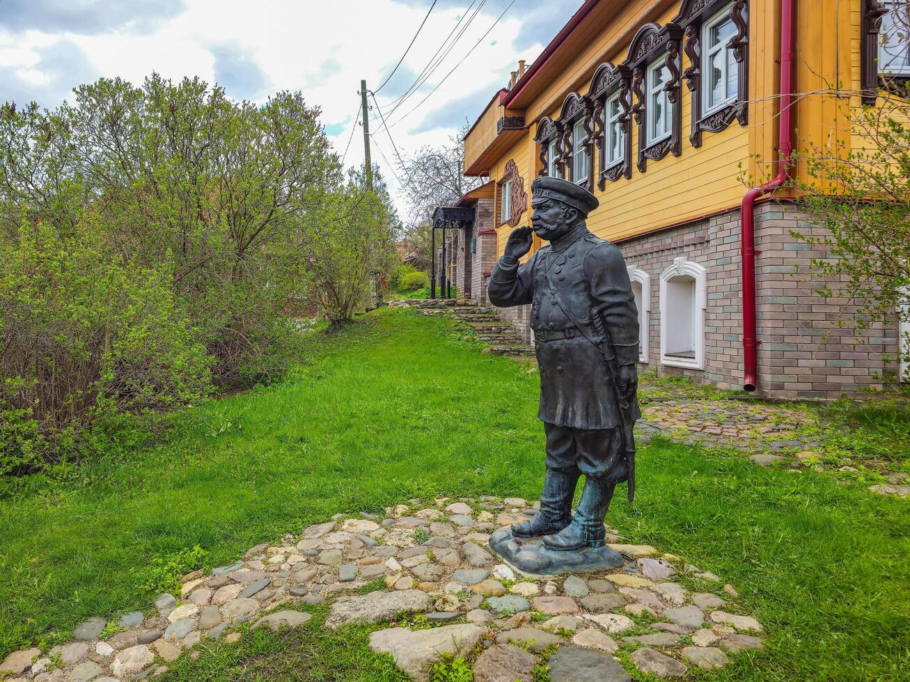 Plyos, Russia, May 10, 2024 Genre sculpture of a policeman in the Plyos. photo