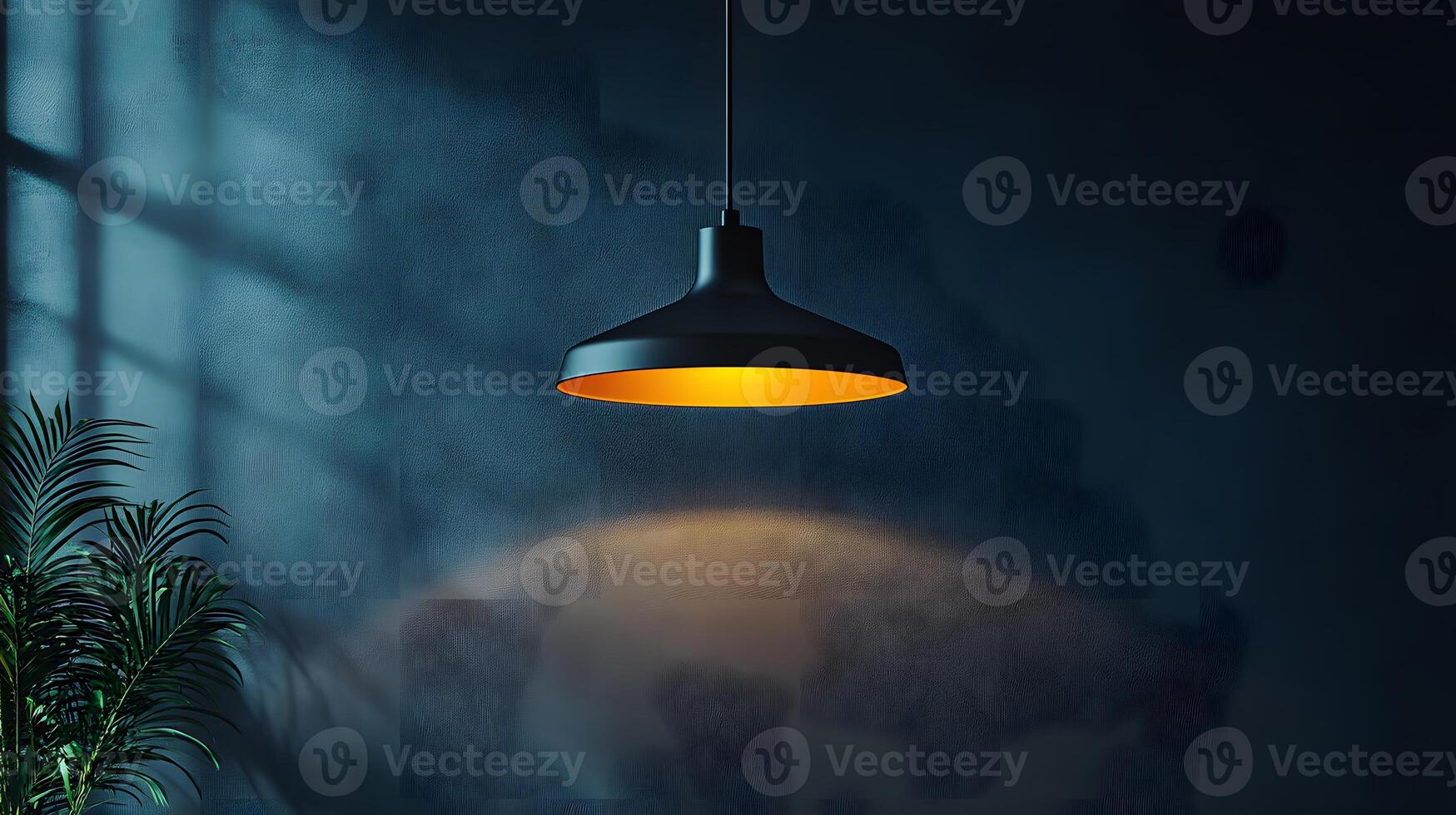 Minimalist pendant lamp creating dramatic spotlight effect against black wall, showcasing industrial design with warm light glow in contemporary interior setting. glow photo