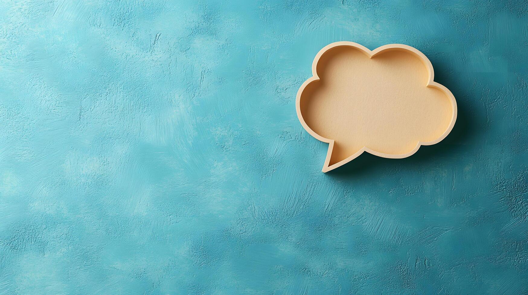 Light blue background features speech bubble cutout in paper craft style, presenting communication concept with beige balloon shape and soft shadow effects. modern photo