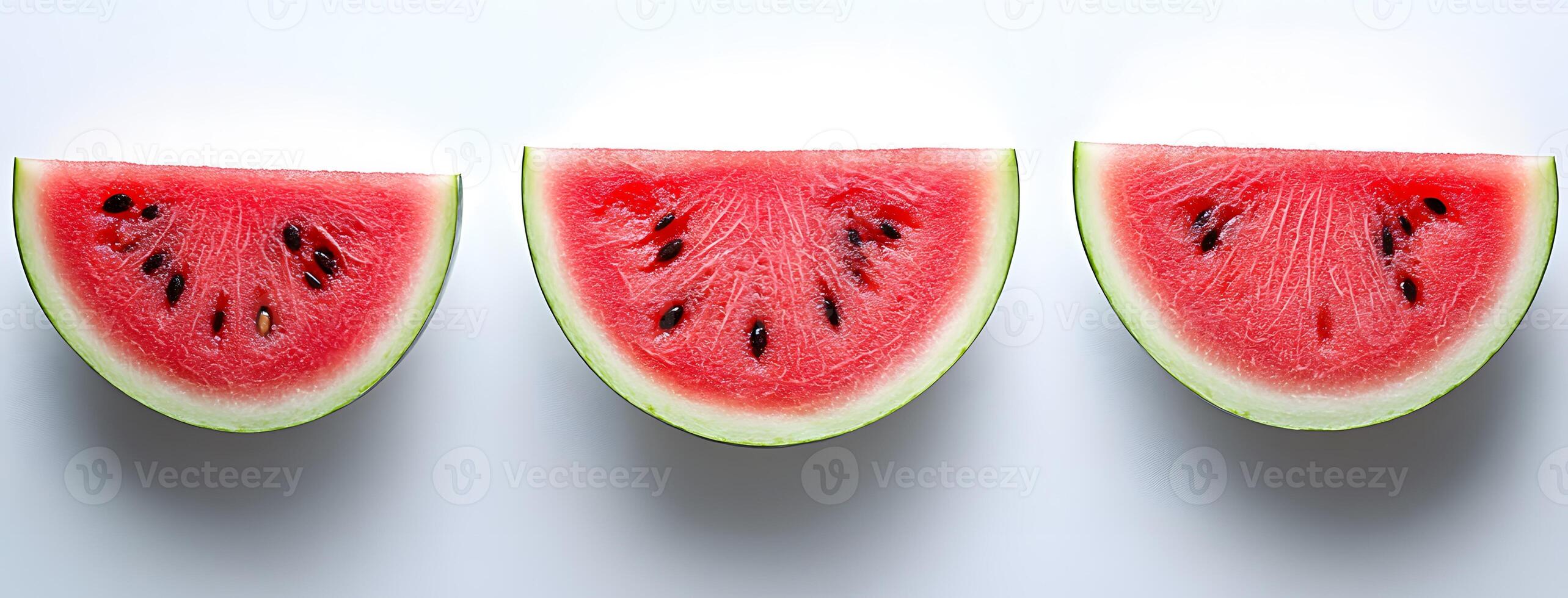 Three Watermelon Slices Arranged In A Row photo