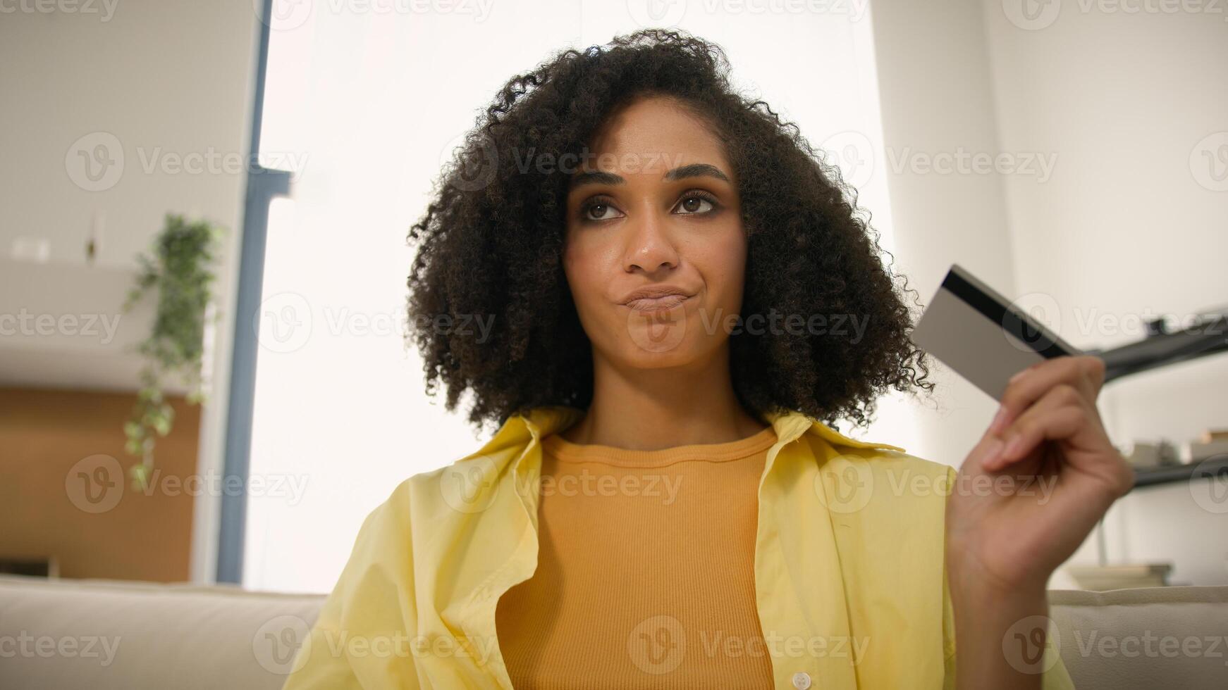 POV webcam view African American woman upset stressed girl pay online with laptop and credit card failure error secure number no money problem reject bank payment bankruptcy blocked account at home photo