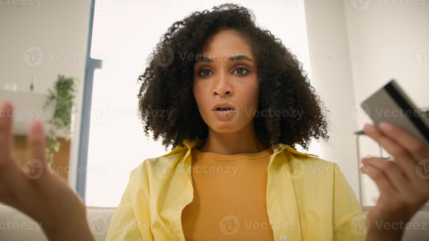 POV webcam view African American woman upset stressed girl pay online with laptop and credit card failure error secure number no money problem reject bank payment bankruptcy blocked account at home photo