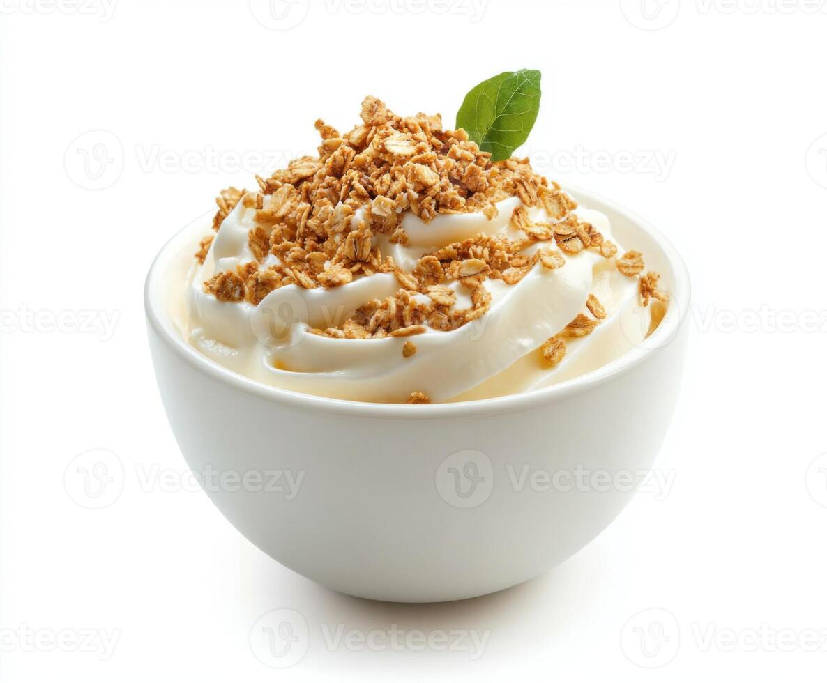 Creamy yogurt topped with crunchy granola and a fresh mint leaf creates a delightful snack photo