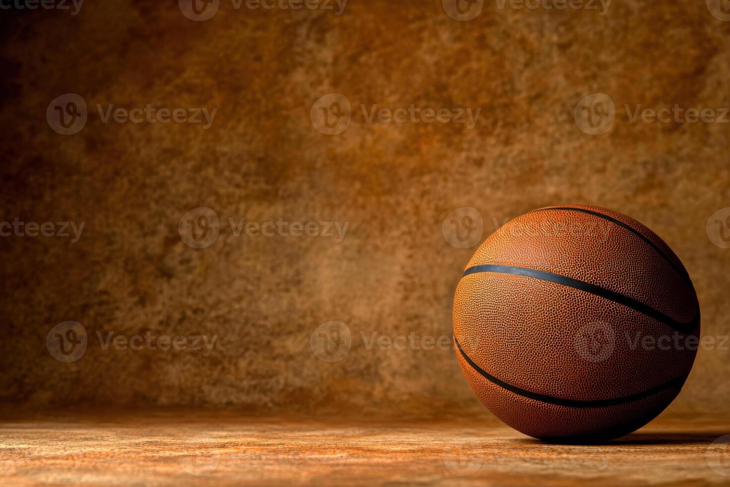 Basketball placed on a wooden floor with a rustic background capturing a moment of stillness photo