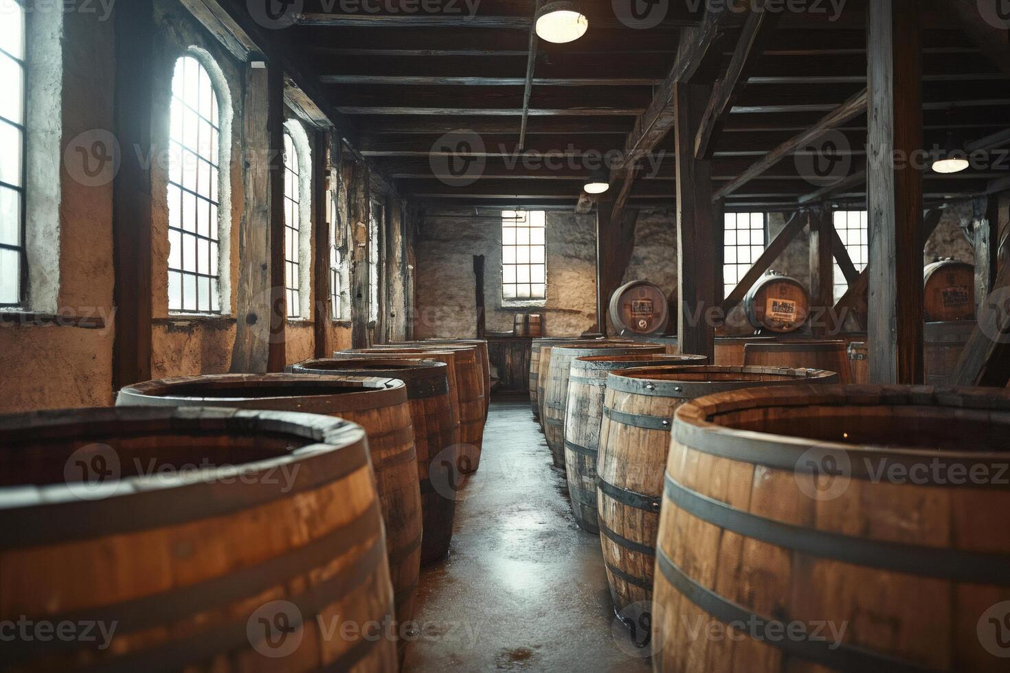 Oak barrels storing beer or wine aging in brewery cellar photo