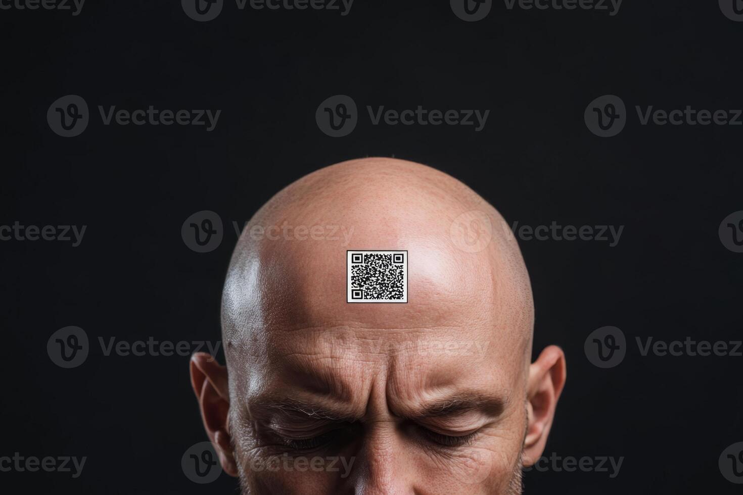 Digital slavery, digital concentration camp, social problem of the future concept. Man concentrates with a QR code displayed on his bald forehead in a dark setting photo