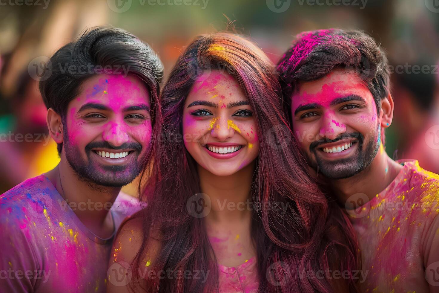 three young people with colored paint on their faces photo