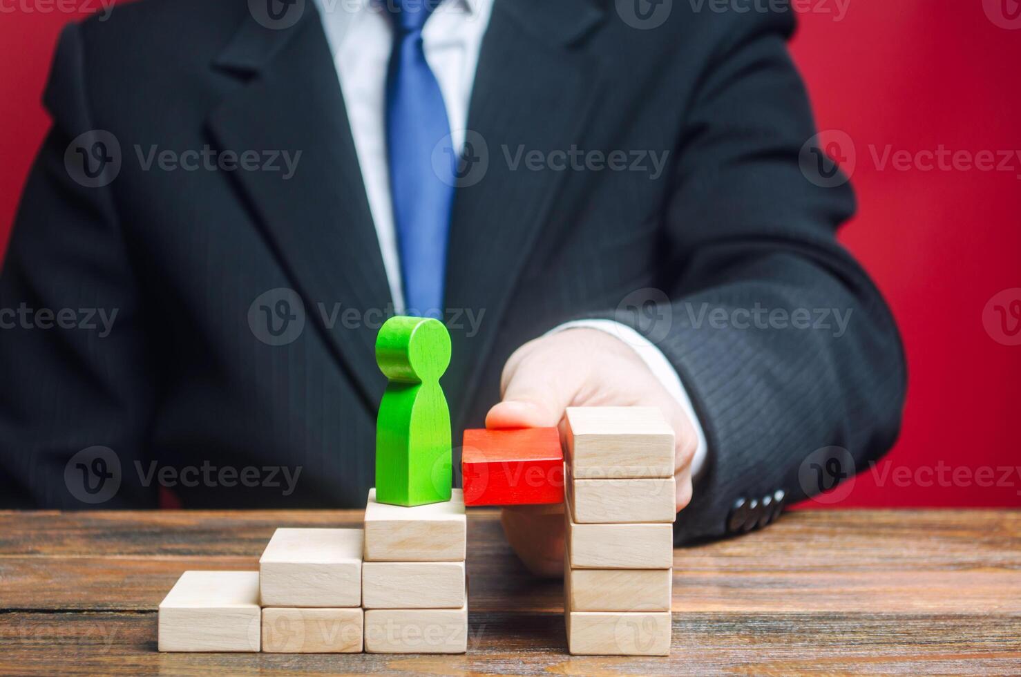 A businessman raises an employee up the career ladder. Appointment of an employee to a next position. Success. Rise in work, transition to a new level. Progress and professional growth. Patrion photo