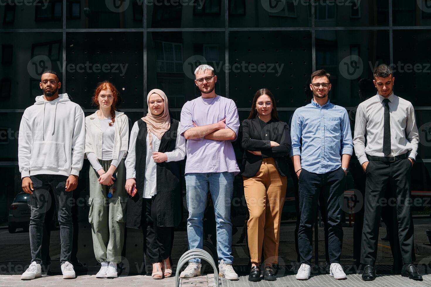 A diverse and confident group of businessmen posing together, radiating success, ambition, and unity, capturing the essence of a dynamic and inspiring business environment photo