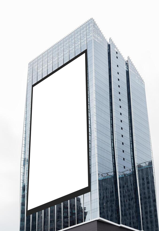 white vertical large LED display billboard on tower building photo