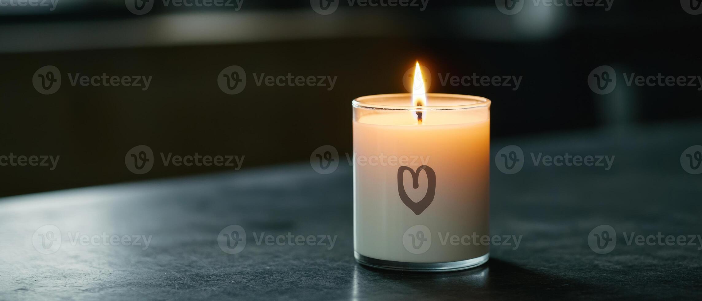 God's unconditional love for valentine's day concept. A lit candle with a heart design, creating a cozy atmosphere. photo
