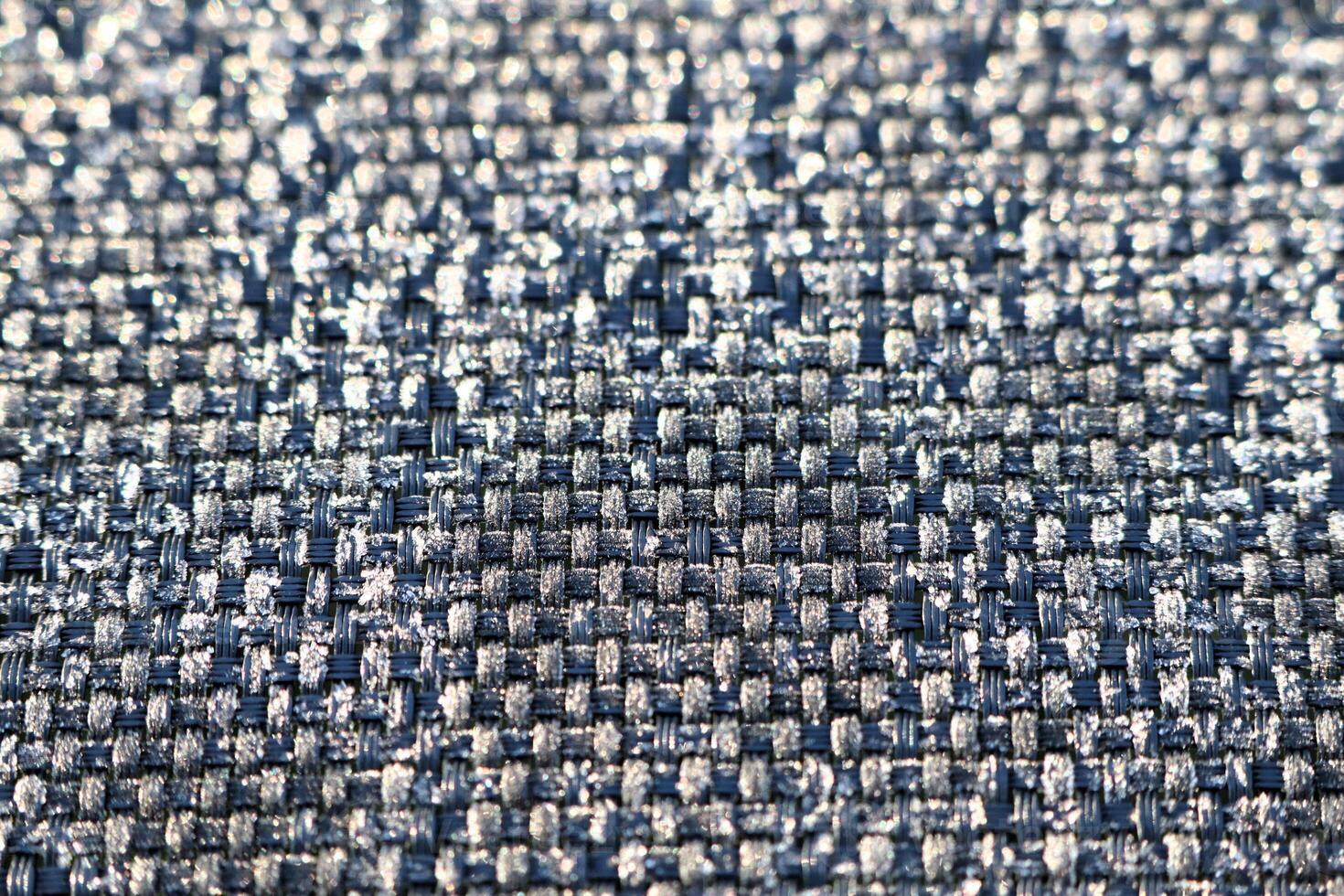 A CloseUp View Showcasing the Textured Fabric Featuring Beautiful Blue and Gray Tones photo