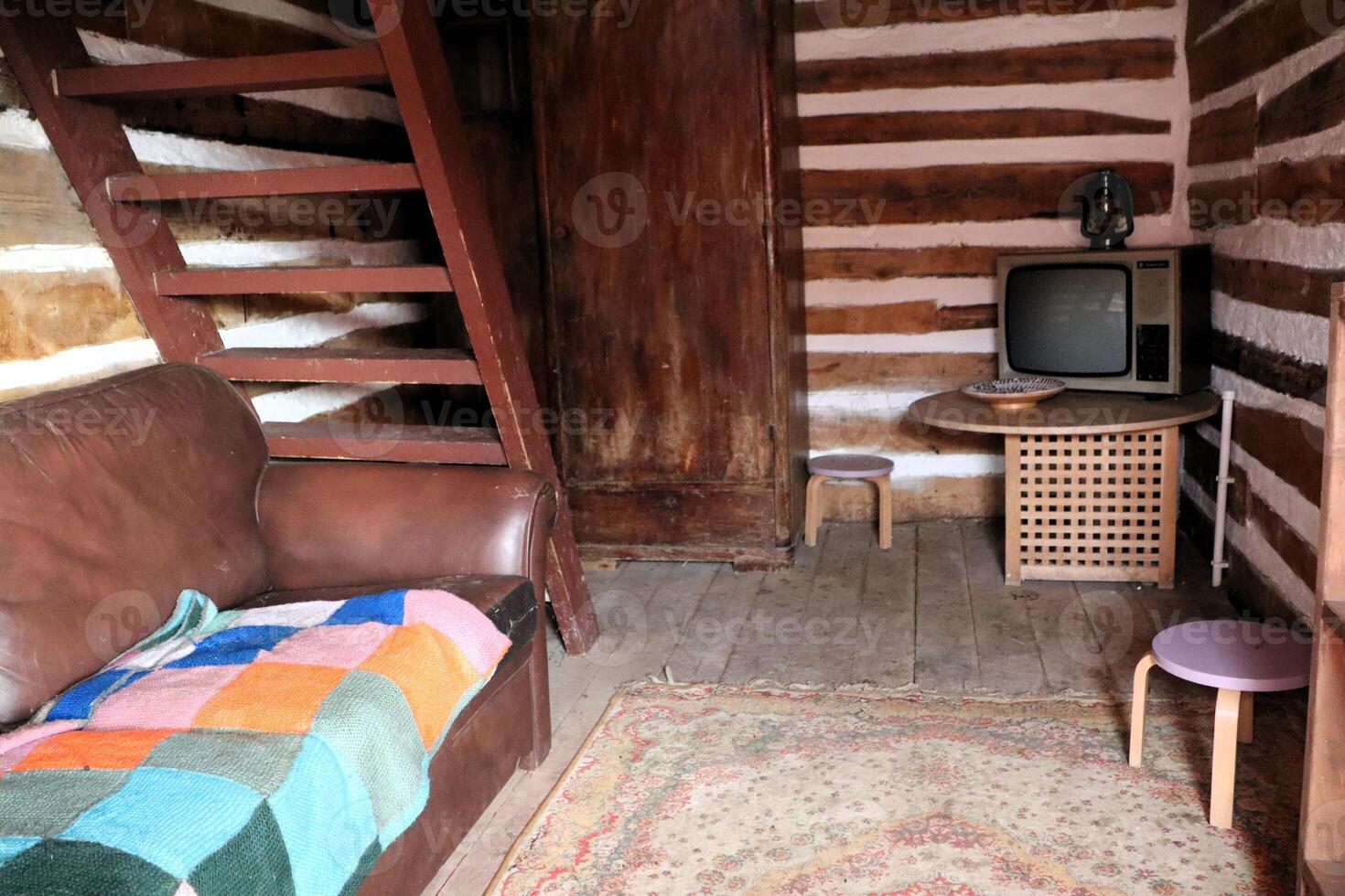 A Rustic Cabin Interior with Vintage Decor, creating a warm and nostalgic ambiance photo