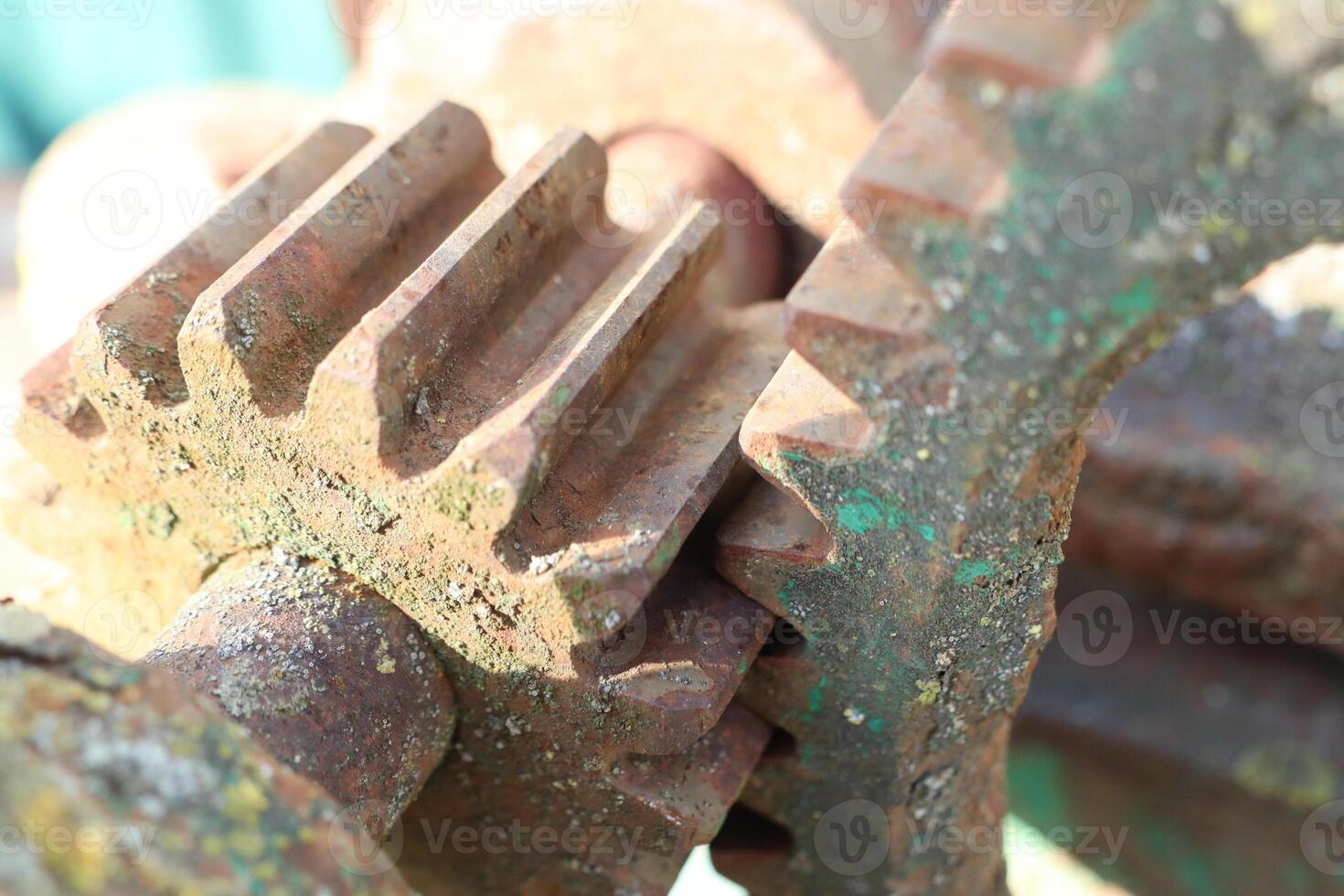 An Intricate CloseUp View of Gears Found in Rusty, Old Machinery That Tells a Story photo