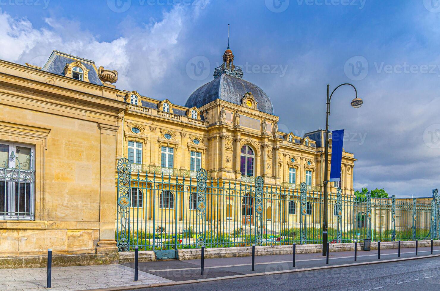 The Picardy Museum Musee de Picardie Second Empire style eclectic architecture style building in Amiens old historical city centre, blue sky background, Somme department photo