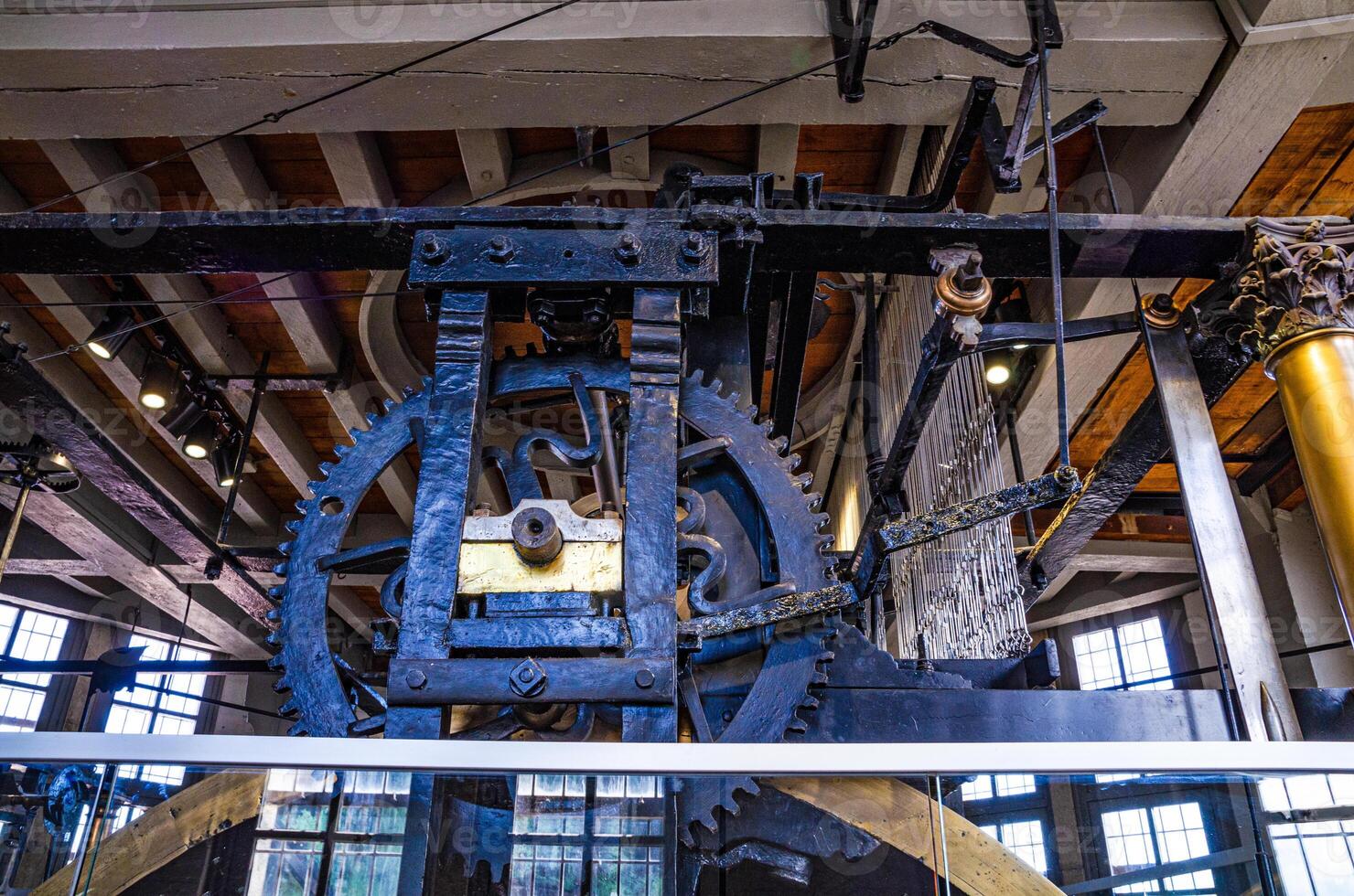 Old antique clock gear mechanism of a big tower clock, tower clockwork photo