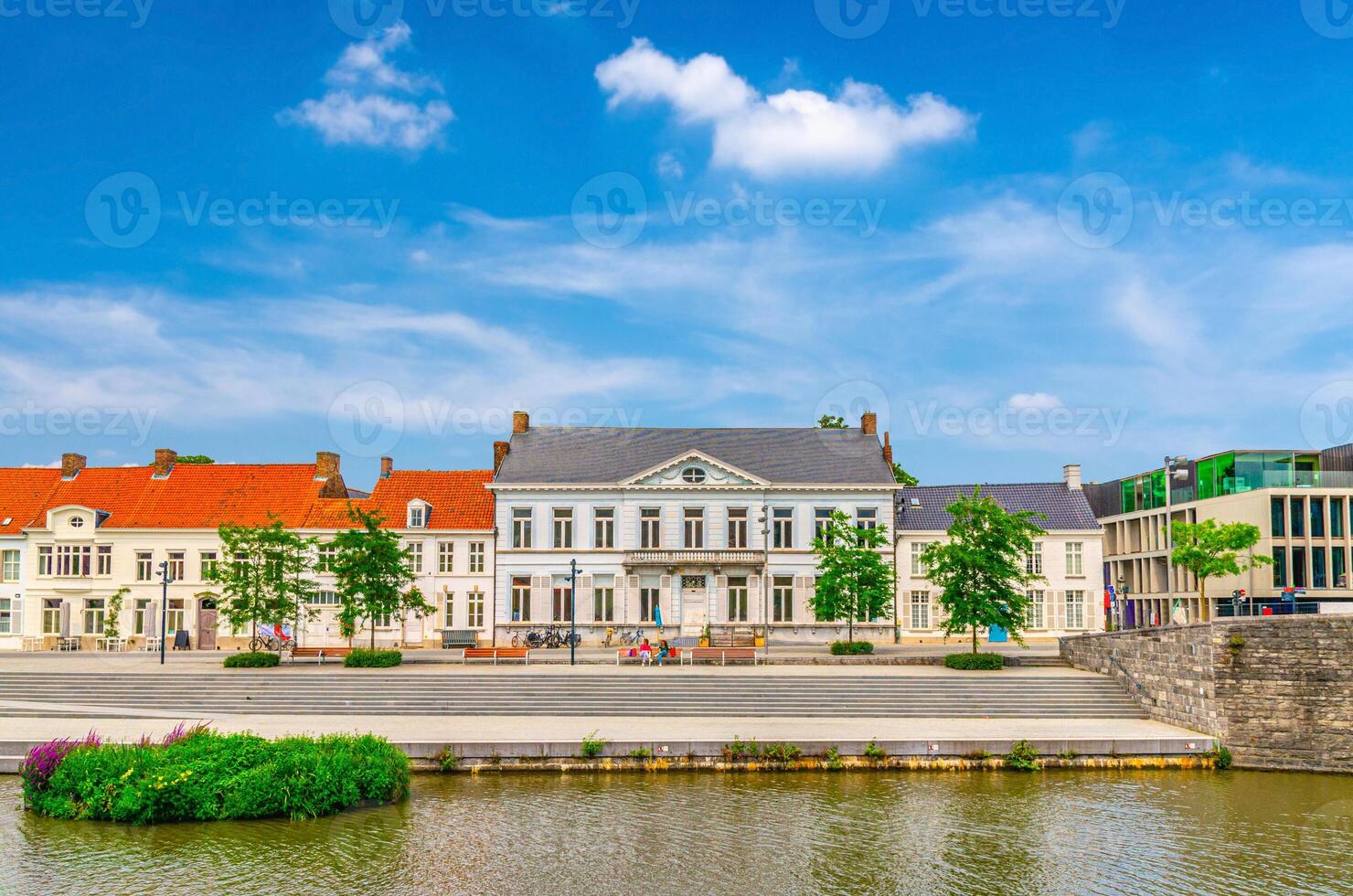 Arts centre BUDA on Buda Island and embankment promenade of Lys river in Kortrijk city historical centre, belgium landmark, Flemish Beguinages, West Flanders province, Flemish Region, Belgium photo