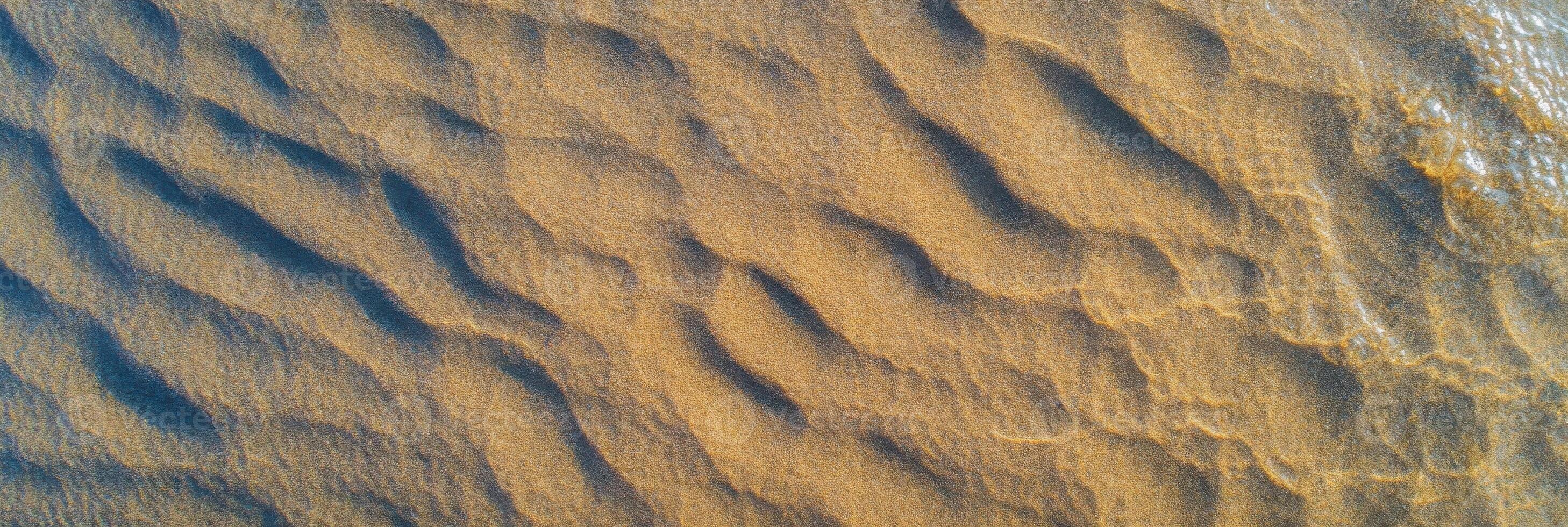 Aerial view of ripples in sand on a beach seashore texture pattern nature landscape photo