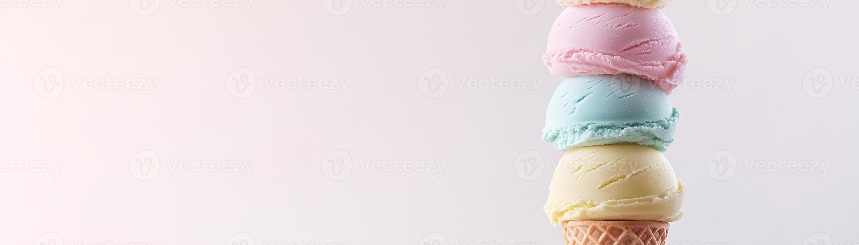 A vibrant tower of 3D ice cream scoops in shades of red, orange, yellow, green, blue, and purple is perfectly stacked on a waffle cone. The clean background offers ample space for text photo