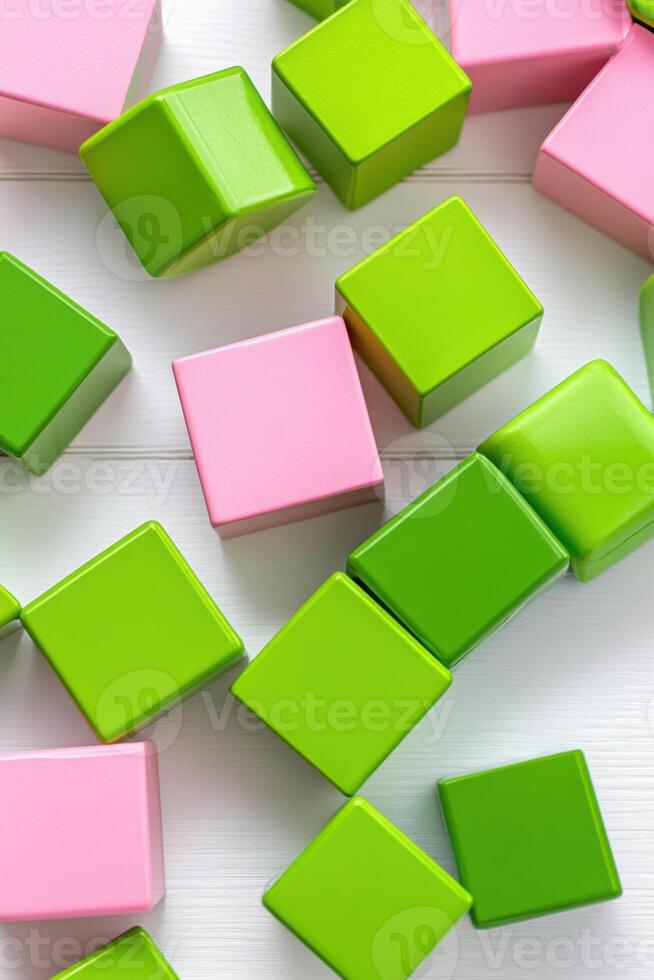 Brightly colored building blocks scattered on a white table create a cheerful and playful atmosphere for creative playtime photo