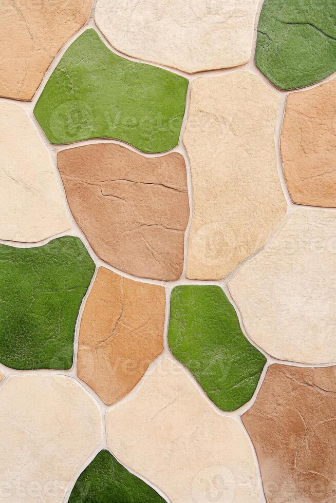 Close-up of tree bark with natural textures in warm brown shades and patches of vibrant moss showcasing earthy colors and intricate detail in a forest setting photo