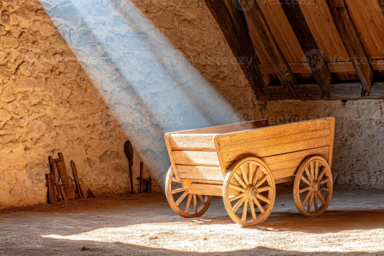 Charming wooden cart in a barn surrounded by rustic tools and soft gray-blue lighting evokes a serene countryside atmosphere photo