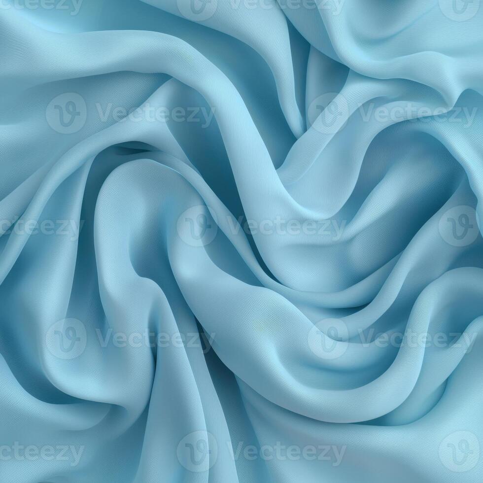 Close up of light blue fabric with soft folds and wrinkles photo