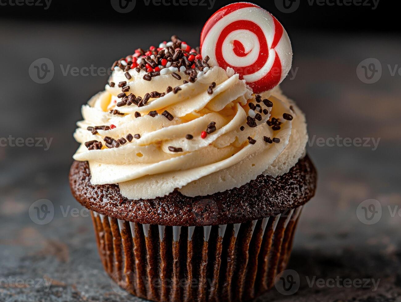 Delicious chocolate cupcake with vanilla frosting and sprinkles photo