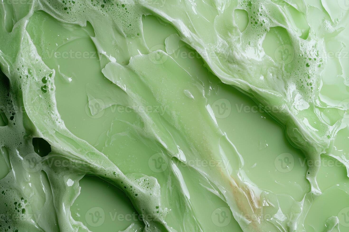 Abstract green gel texture with foam photo