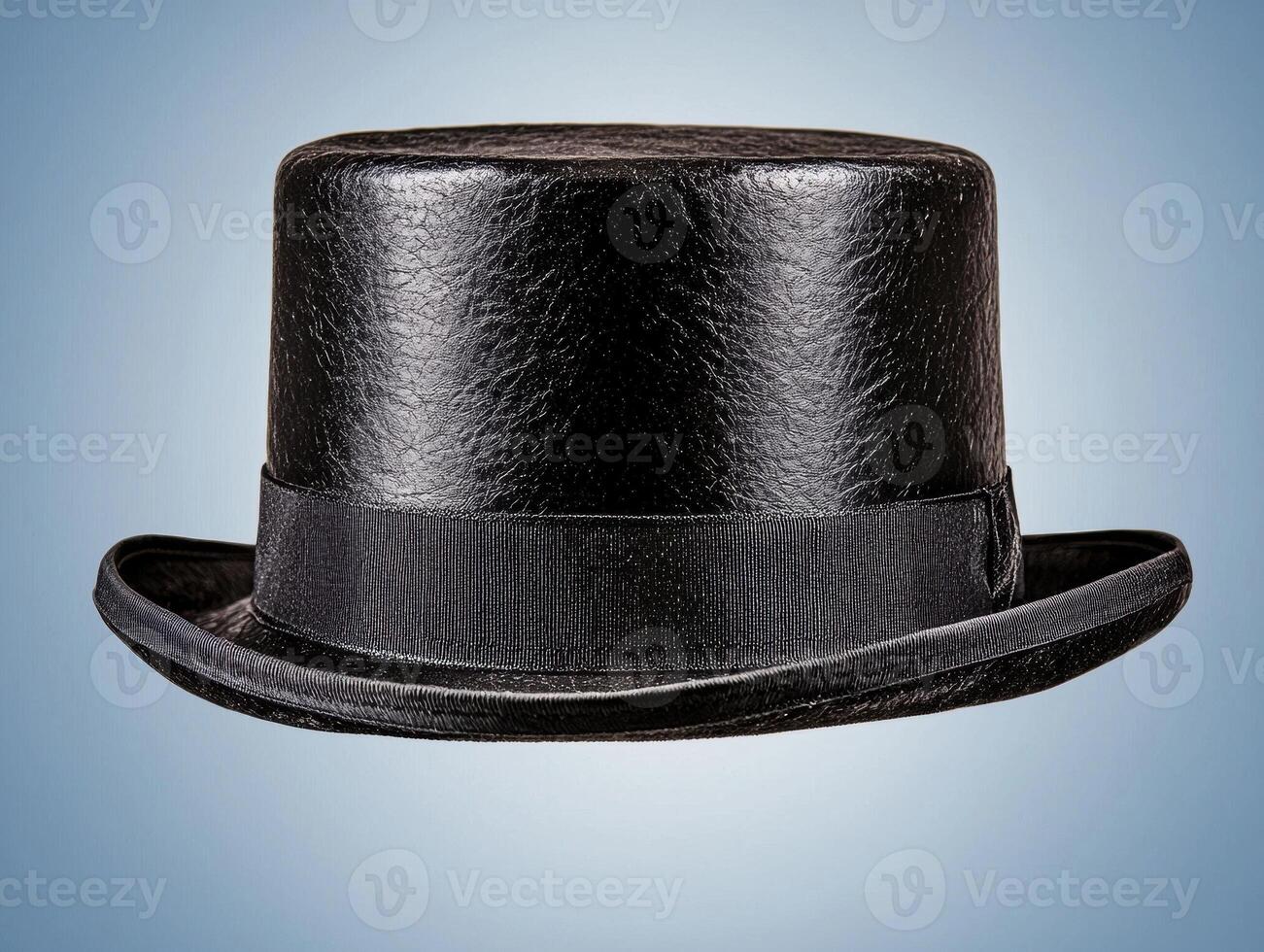 Classic black top hat on a blue background photo
