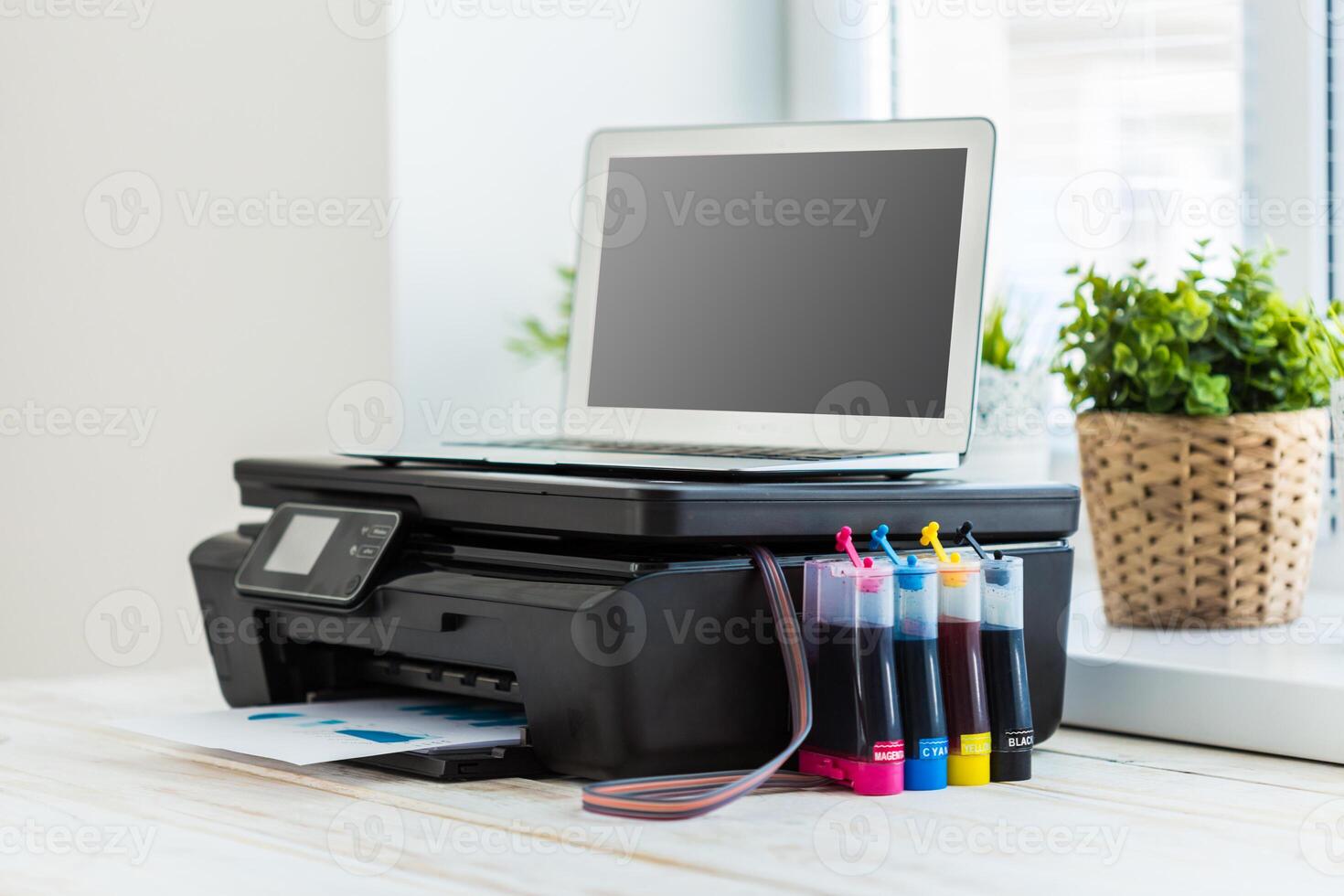 Printer and computer. Office table photo
