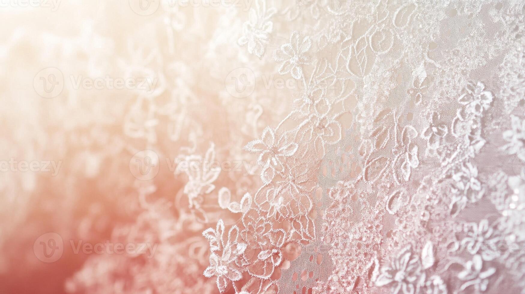 Delicate lace fabric adorned with intricate floral patterns illuminated by soft light photo