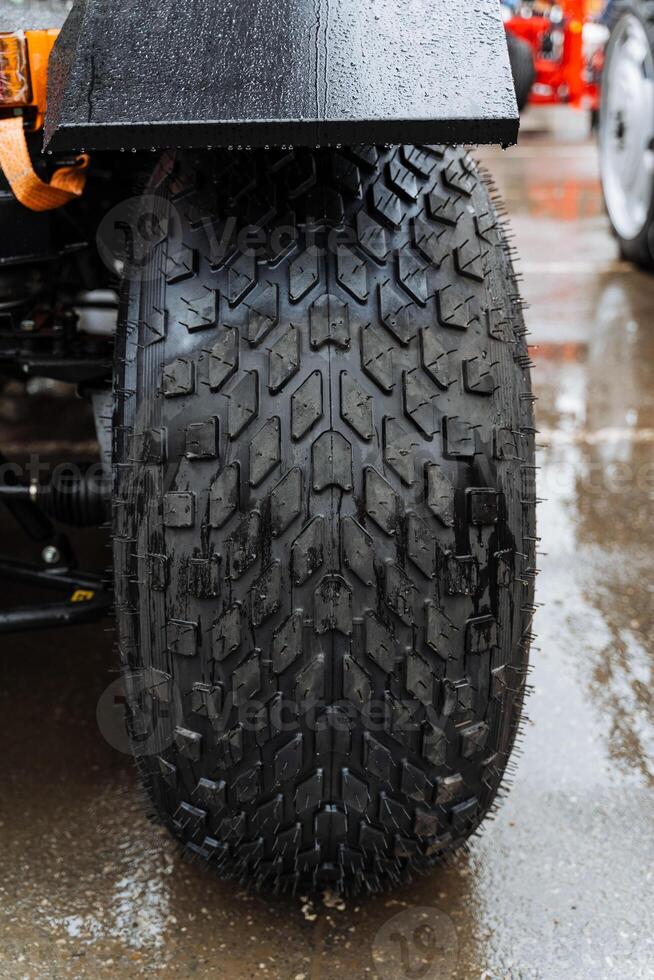 A close up of a tire on a tractor photo
