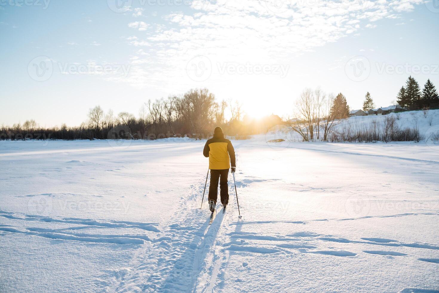A person on skis in the snow photo